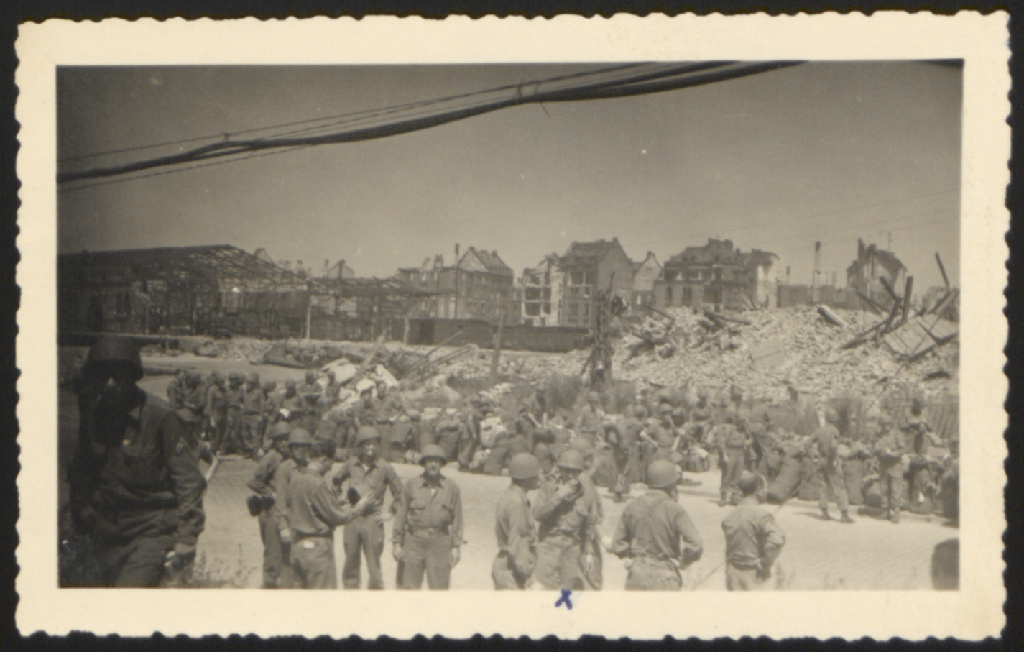 Mainz railroad station area, July 1945 — handwritten reverse: “x That's me” (Emanuel Suessmann)